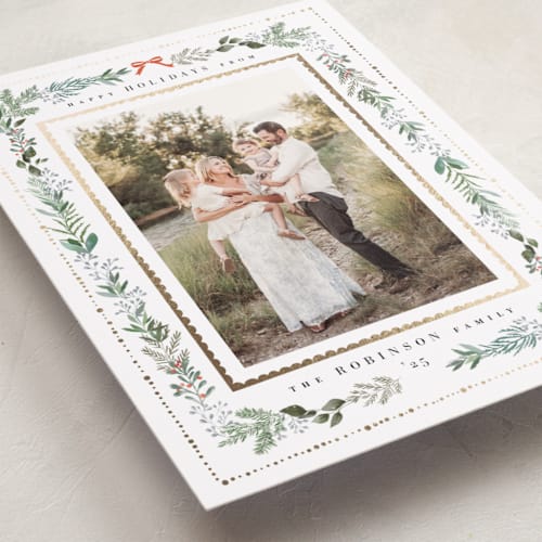 This is a fir foil pressed holiday cards with foil pressed by Hannah Williams called greenery & gold printing on recycled smooth signature in standard