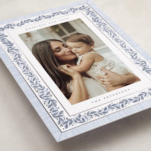 This is a frost foil pressed holiday cards with foil pressed by Jenna Holcomb called antique greenery printing on recycled smooth signature in standard