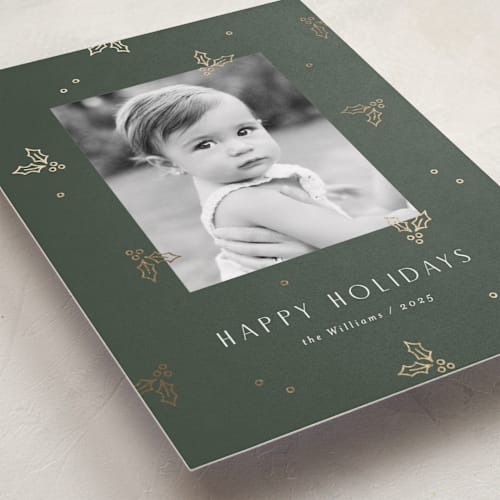 This is a evergreen foil pressed holiday cards with foil pressed by Michelle Taylor called jolly holly printing on recycled smooth signature in standard