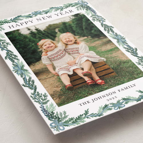 This is a frosty blue foil pressed holiday cards with foil pressed by Angel Walker called traditional christmas printing on recycled smooth signature in standard