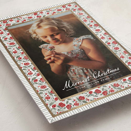 This is a sage foil pressed holiday cards with foil pressed by Jenna Holcomb called a cottage christmas printing on recycled smooth signature in standard