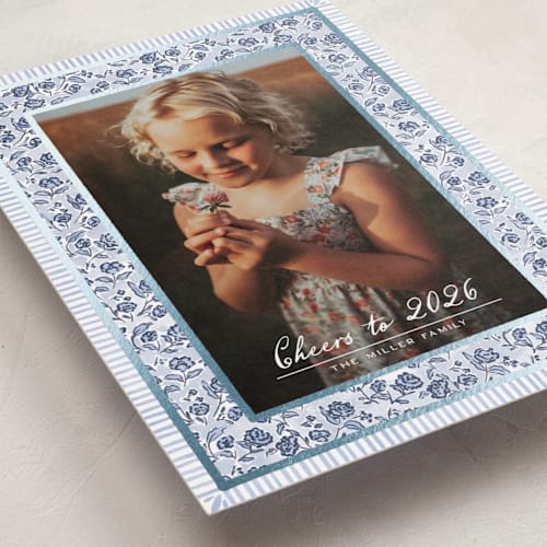 This is a frost foil pressed holiday cards with foil pressed by Jenna Holcomb called a cottage christmas printing on recycled smooth signature in standard