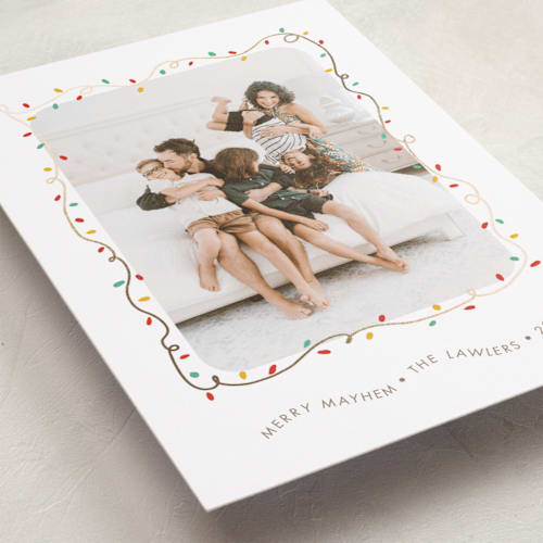 This is a frosting foil pressed holiday cards with foil pressed by Holly Whitcomb called crazy lights printing on recycled smooth signature in standard