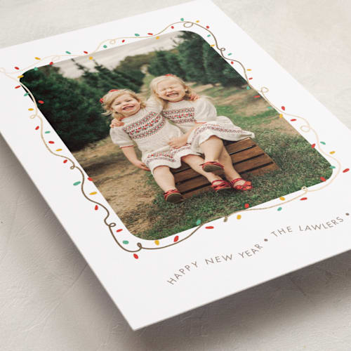 This is a frosting foil pressed holiday cards with foil pressed by Holly Whitcomb called crazy lights printing on recycled smooth signature in standard