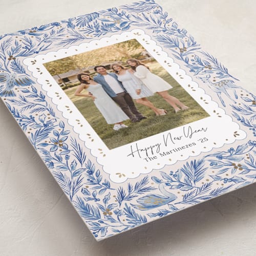 This is a porcelain foil pressed holiday cards with foil pressed by Elly called winter cottage printing on recycled smooth signature in standard