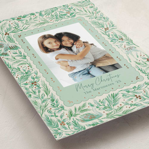 This is a pine foil pressed holiday cards with foil pressed by Elly called winter cottage printing on recycled smooth signature in standard