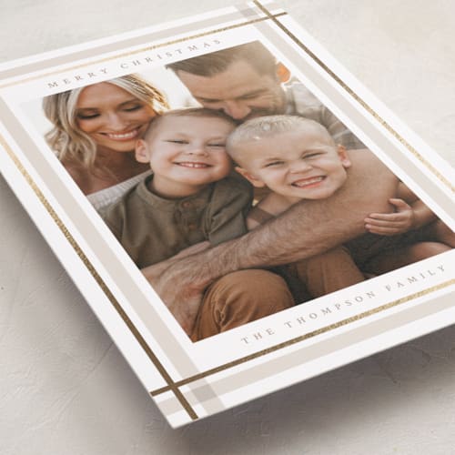 This is a tan foil pressed holiday cards with foil pressed by Ashley Presutti Beasley called traditional plaid printing on recycled smooth signature in standard
