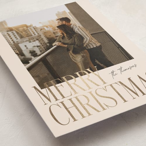 This is a eggnog foil pressed holiday cards with foil pressed by Ekko Studio called merry stack printing on recycled smooth signature in standard