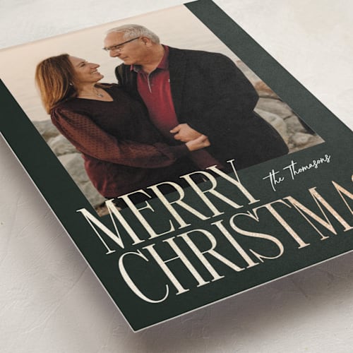 This is a evergreen foil pressed holiday cards with foil pressed by Ekko Studio called merry stack printing on recycled smooth signature in standard