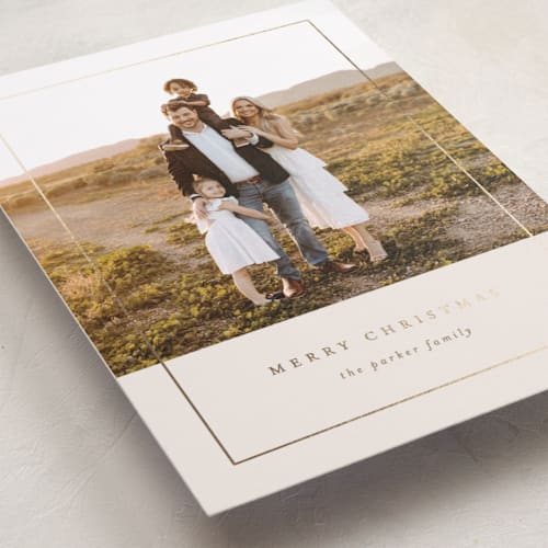 This is a almond foil pressed holiday cards with foil pressed by Brianne Larsen called classic border printing on recycled smooth signature in standard
