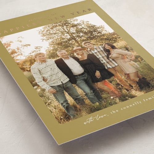 This is a butterscotch foil pressed holiday cards with foil pressed by Chris Griffith called frame of happiness printing on recycled smooth signature in standard