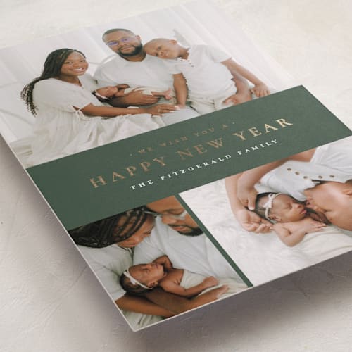 This is a eucalyptus foil pressed holiday cards with foil pressed by Wildfield Paper Co called quartzite printing on recycled smooth signature in standard