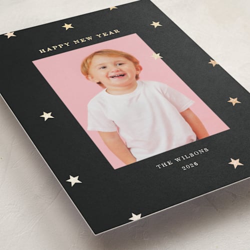 This is a midnight foil pressed holiday cards with foil pressed by Kercia Jane called tiny star confetti printing on recycled smooth signature in standard
