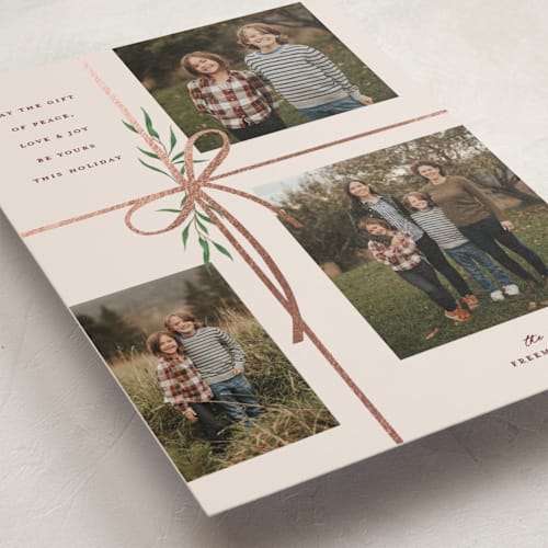 This is a burgundy foil pressed holiday cards with foil pressed by Susan Zinader called holiday gifts printing on recycled smooth signature in standard