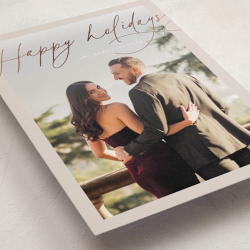 This is a cookie dough foil pressed holiday cards with foil pressed by Nicole Walsh called looped printing on recycled smooth signature in standard