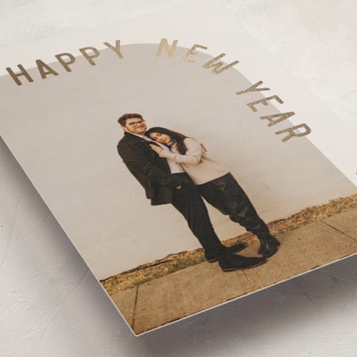 This is a eggnog foil pressed holiday cards with foil pressed by Brianne Larsen called curve printing on recycled smooth signature in standard