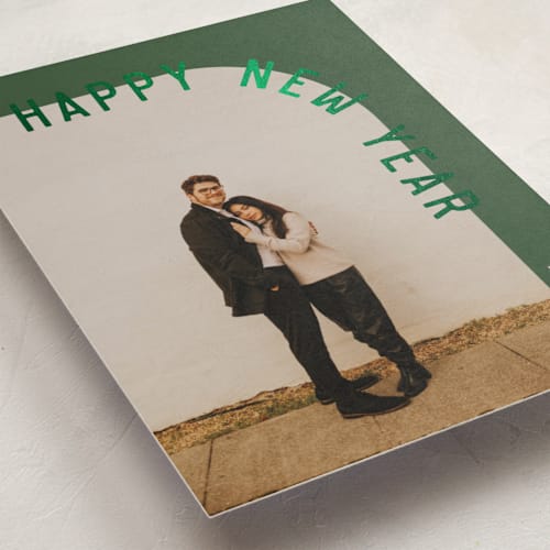This is a pine foil pressed holiday cards with foil pressed by Brianne Larsen called curve printing on recycled smooth signature in standard