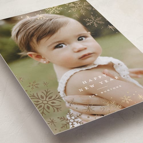 This is a snow foil pressed holiday cards with foil pressed by Wildfield Paper Co called glistening snow printing on recycled smooth signature in standard