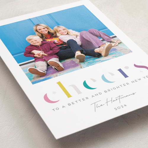 This is a funfetti gloss press holiday cards with gloss press by Lisa McLean called deconstructed cheers printing on recycled smooth signature in standard