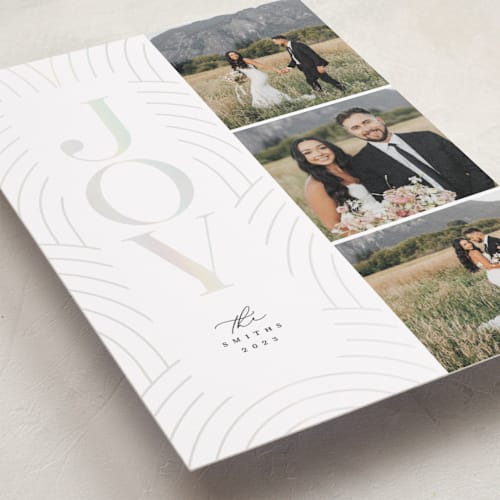 This is a raven gloss press holiday cards with gloss press by Laura Hamm called classical joy printing on recycled smooth signature in standard