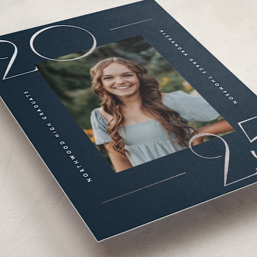 This is a navy graduation announcements with foil pressed by Kelly Schmidt called numbered printing on recycled smooth signature in standard