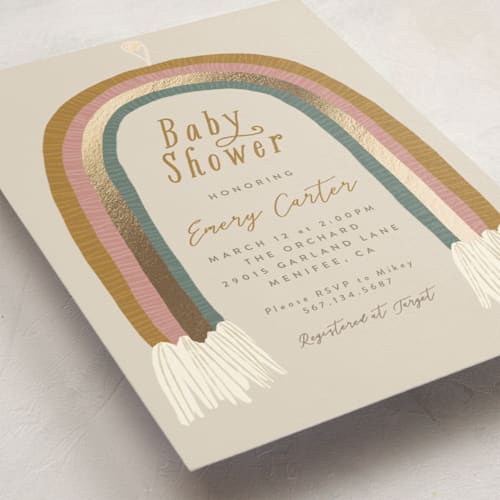 This is a cream foil stamped baby shower invitations with foil pressed by Joanna Griffin called rainbow child printing on signature in standard