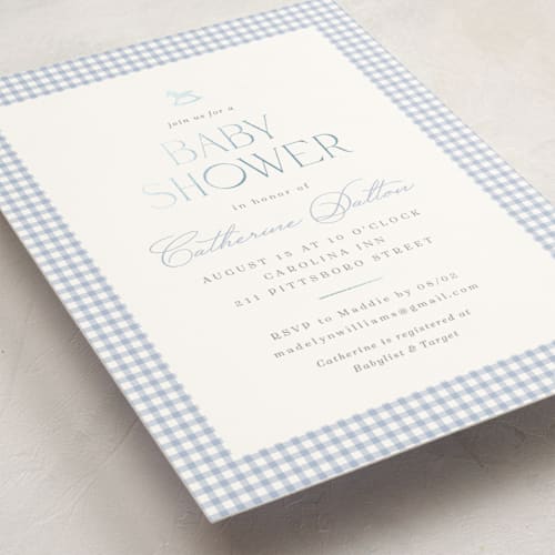 This is a baby blue foil stamped baby shower invitations with foil pressed by Olivia Raufman called gingham rockinghorse printing on signature in standard