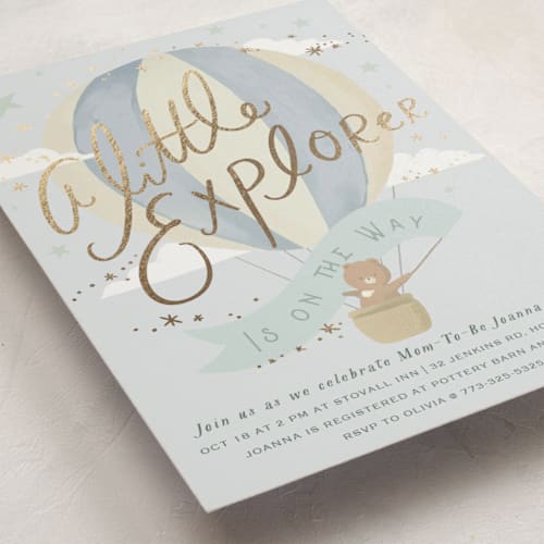This is a powder foil stamped baby shower invitations with foil pressed by Hannah Williams called little explorer printing on signature in standard