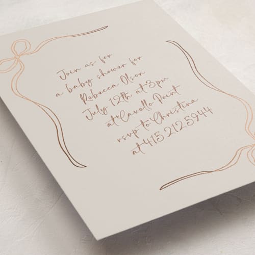 This is a champagne foil stamped baby shower invitations with foil pressed by Joyce Pinheiro called tied with love printing on signature in standard