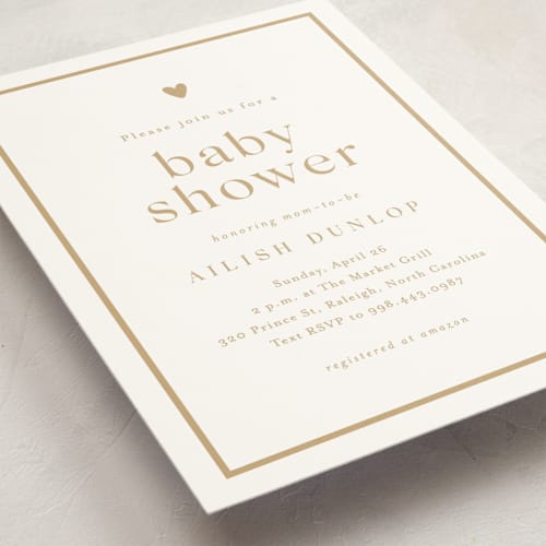 This is a golden baby shower invitations with standard by Stacey Meacham called heartbeat printing on signature in standard