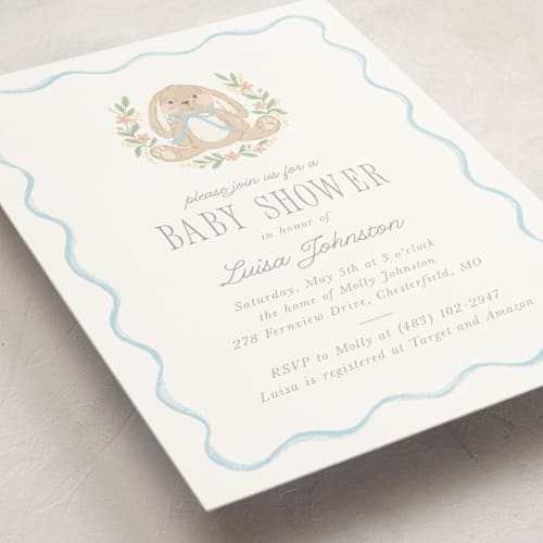 This is a cornflower baby shower invitations with standard by Laura Hankins called bunny crest printing on signature in standard
