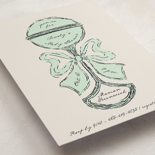 This is a mint baby shower invitations with standard by Gwen Bedat called antique rattle printing on signature in standard
