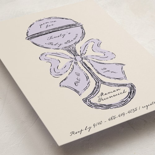This is a lavender baby shower invitations with standard by Gwen Bedat called antique rattle printing on signature in standard