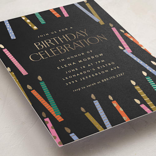 This is a midnight holiday party invitations with foil pressed by Ellen Schlegelmilch called scattered candles printing on signature in standard