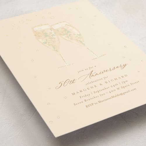 This is a bubbly holiday party invitations with foil pressed by Kamala Nahas called champagne toast printing on signature in standard