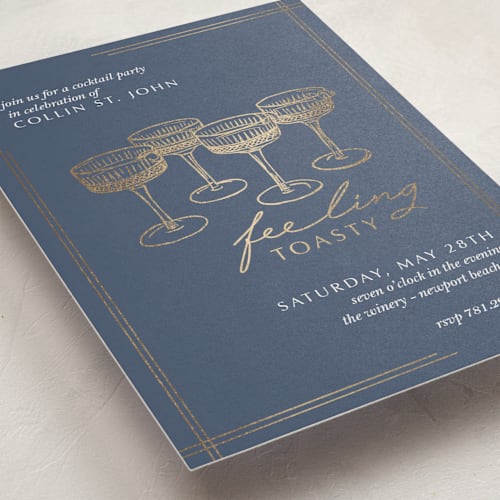 This is a ice holiday party invitations with foil pressed by Eva Tadros called feeling toasty printing on signature in standard