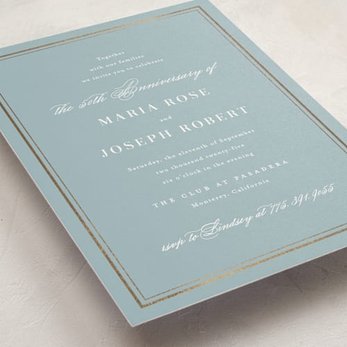 This is a powder blue holiday party invitations with foil pressed by Jennifer Postorino called polished printing on signature in standard
