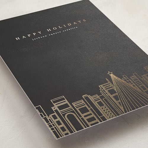 This is a midnight business holiday cards with foil pressed by Anna Joseph called holiday skyline printing on signature in standard