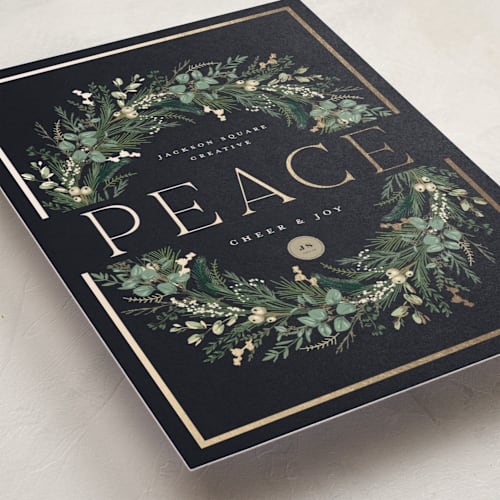 This is a juniper business holiday cards with foil pressed by Susan Moyal called peace on earth printing on signature in standard