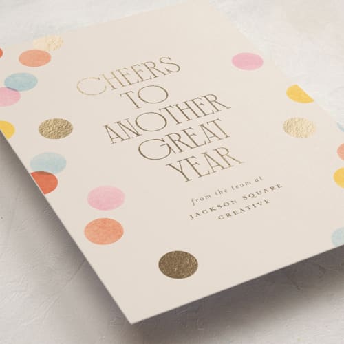 This is a peach business holiday cards with foil pressed by Ellen Schlegelmilch called confetti dots printing on signature in standard