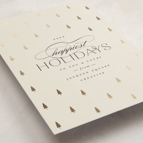 This is a ivory business holiday cards with foil pressed by Carolyn Nicks called joyful trees printing on signature in standard