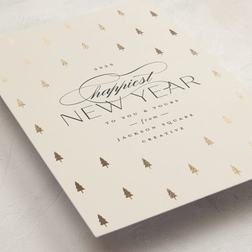 This is a ivory business holiday cards with foil pressed by Carolyn Nicks called joyful trees printing on signature in standard