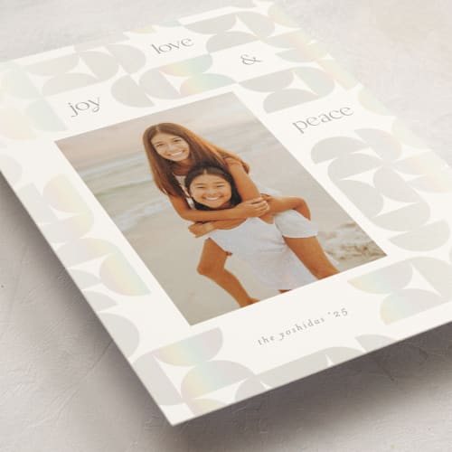 This is a frost gloss press holiday cards with gloss press by Lisa McLean called semi circle pieces printing on signature in standard