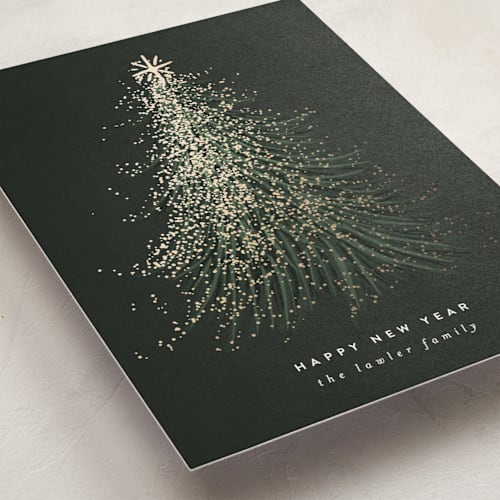 This is a pine foil pressed holiday cards with foil pressed by Leah Bisch called frosted tree printing on signature in standard