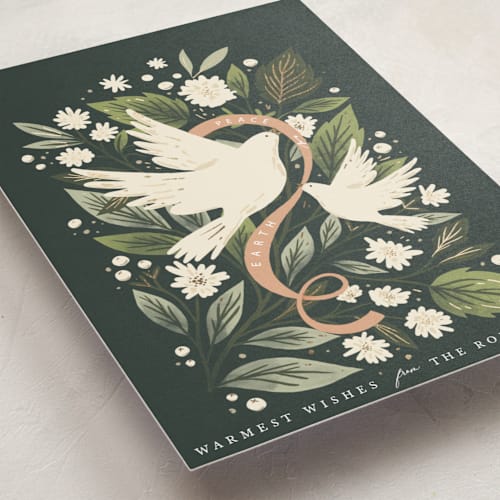 This is a pine foil pressed holiday cards with foil pressed by Hannah Williams called peace dove arch printing on signature in standard