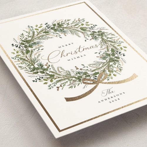 This is a pine foil pressed holiday cards with foil pressed by Susan Moyal called christmas bow printing on signature in standard