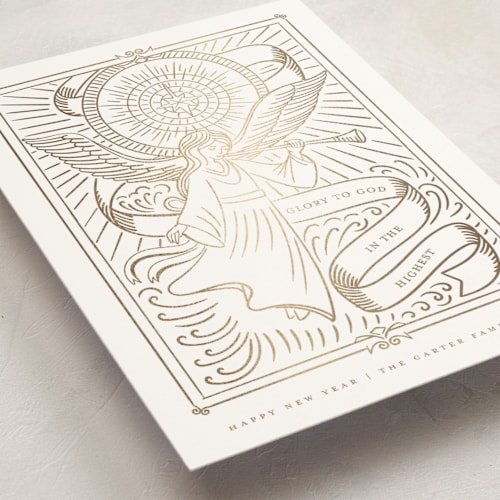 This is a cloud foil pressed holiday cards with foil pressed by Teju Reval called gilded angel printing on signature in standard