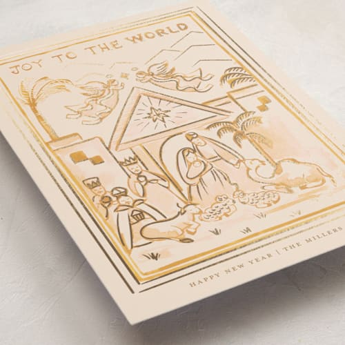 This is a honey foil pressed holiday cards with foil pressed by Teju Reval called nativity scene printing on signature in standard