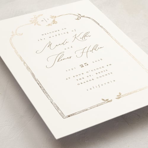 This is a porcelain unique wedding programs with foil pressed by Leah Bisch called reflection printing on signature in folded
