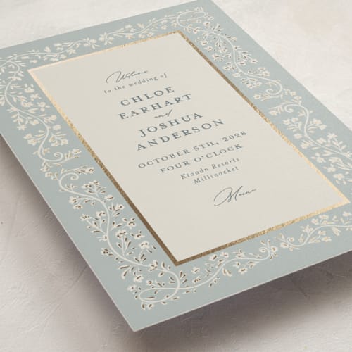 This is a something blue unique wedding programs with foil pressed by Gwen Bedat called floral romance printing on signature in folded